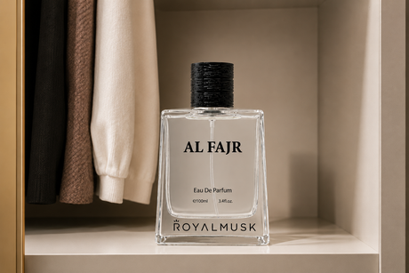 Common perfume storage mistakes illustrated with an AL FAJR Eau de Parfum bottle stored inside a wardrobe shelf, highlighting proper perfume storage away from sunlight and heat to help preserve fragrance longevity.